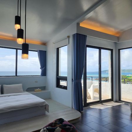 Sea Shore Hotel Manzhou Buitenkant foto