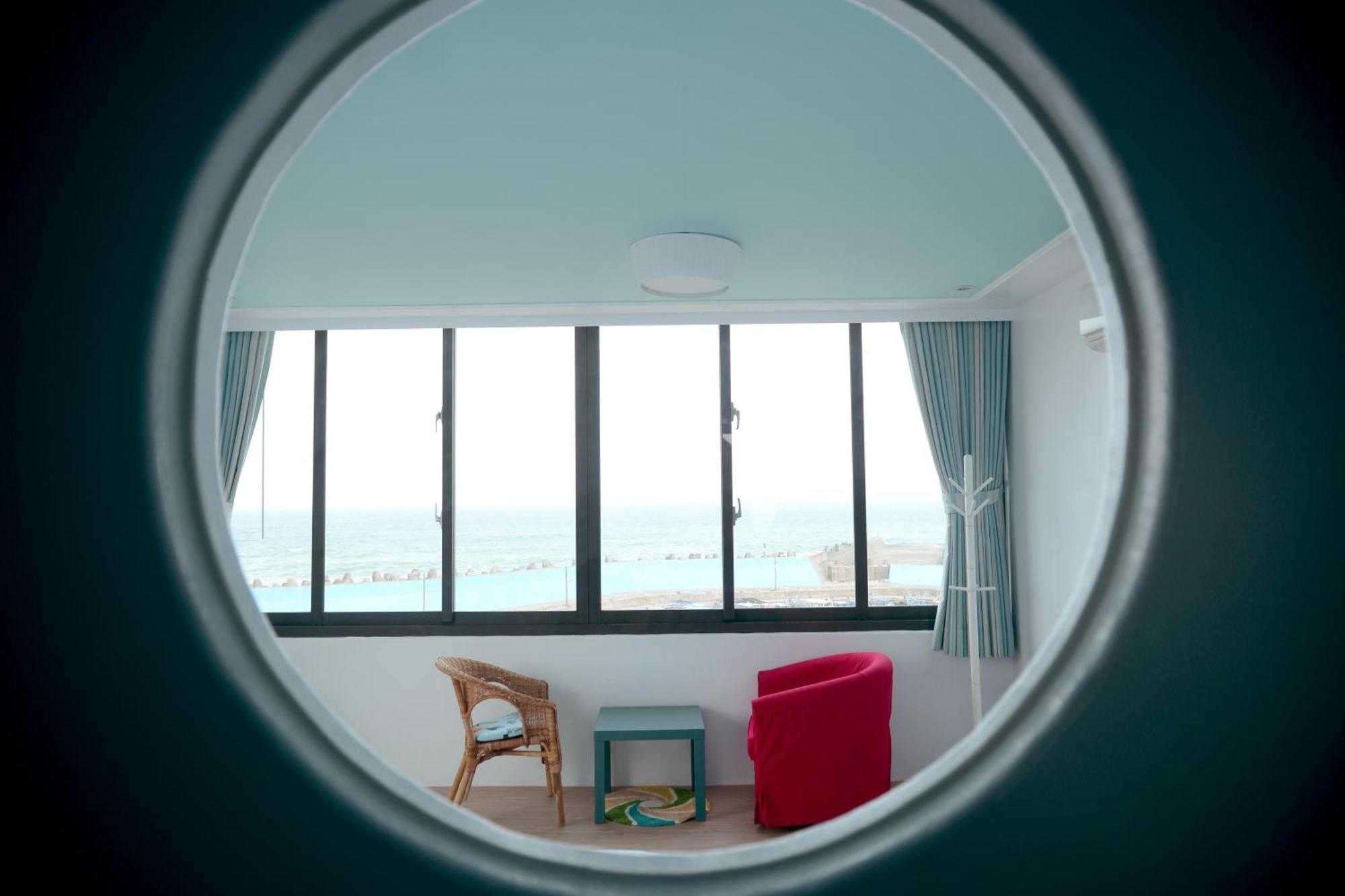 Sea Shore Hotel Manzhou Kamer foto